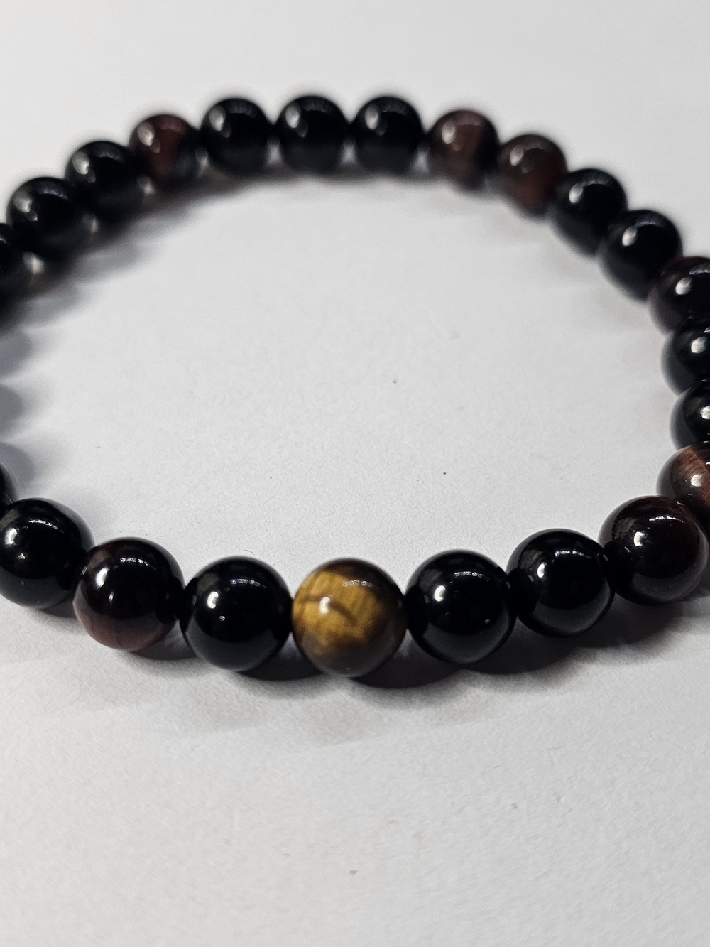 Red Tiger Eye With Yellow Tigers Eye As A Center Peace. Hand Made Beaded Braclet